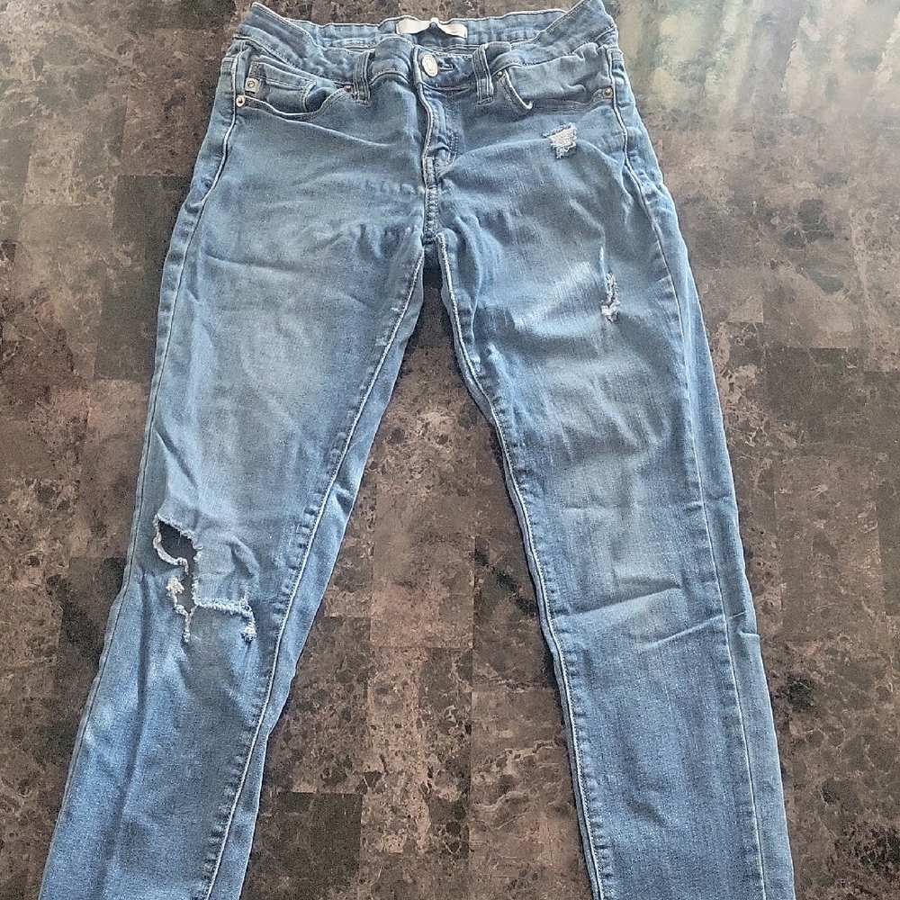Light Blue Skinny Jeans with Distressing and Vintage Look